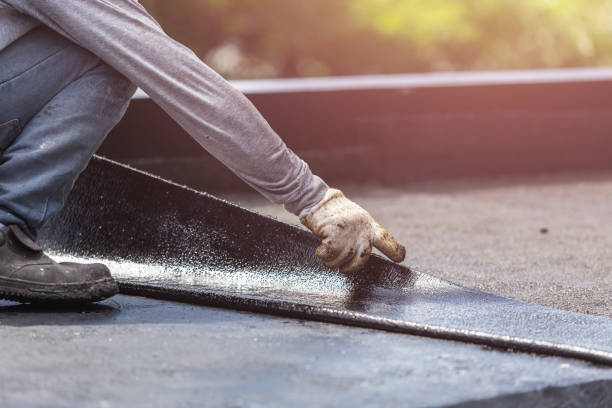 Professional Emergency Waterproofing technician working in Harrisburg, IL